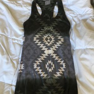 Vocal tribal studded tank